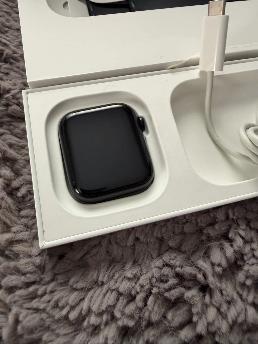 Apple Watch in Black with Black Sport Band